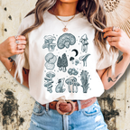 Woman wearing vintage mushroom and fox graphic tee from Juniper Summer