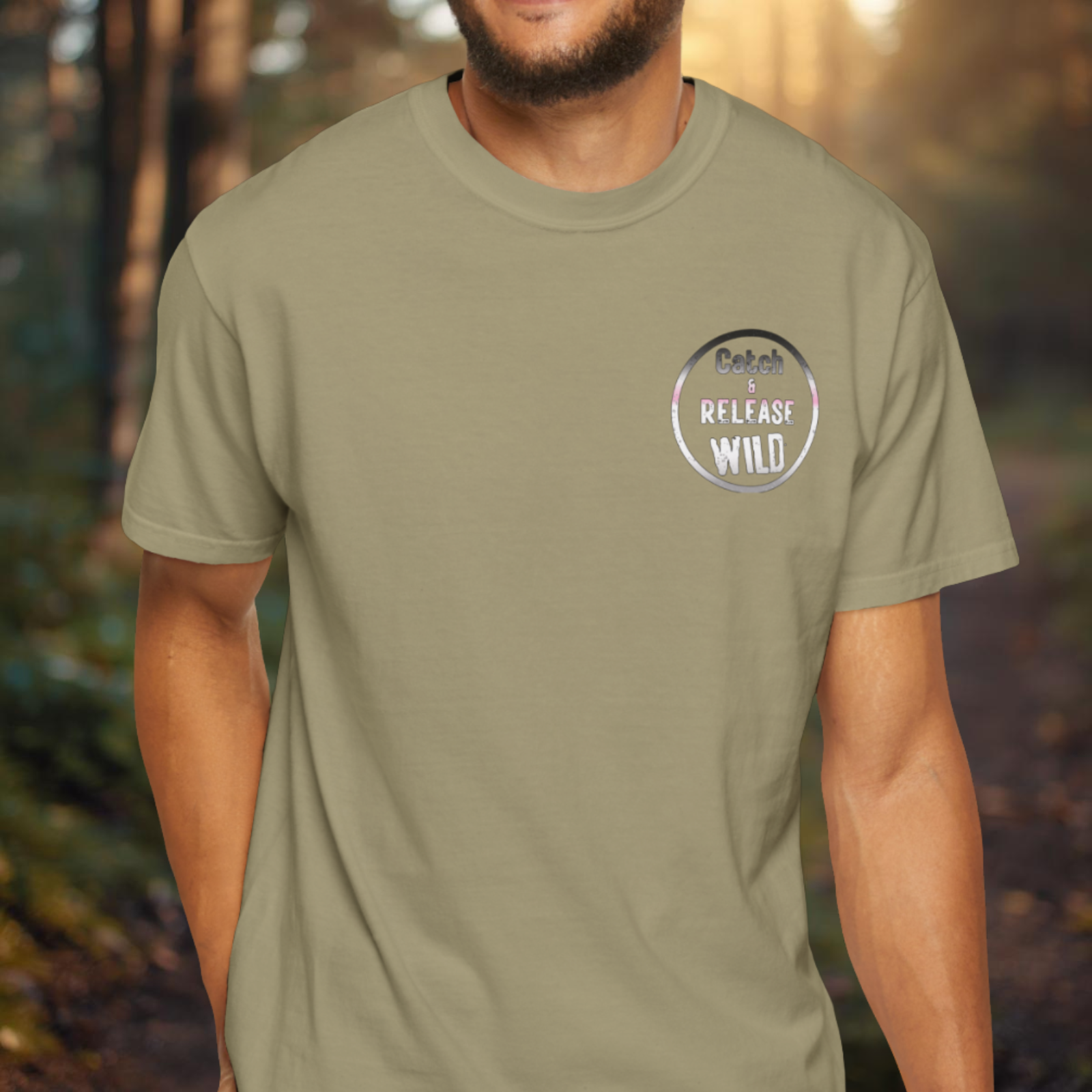 Khaki tee with small circular “Catch & Release Wild” emblem on the left chest.