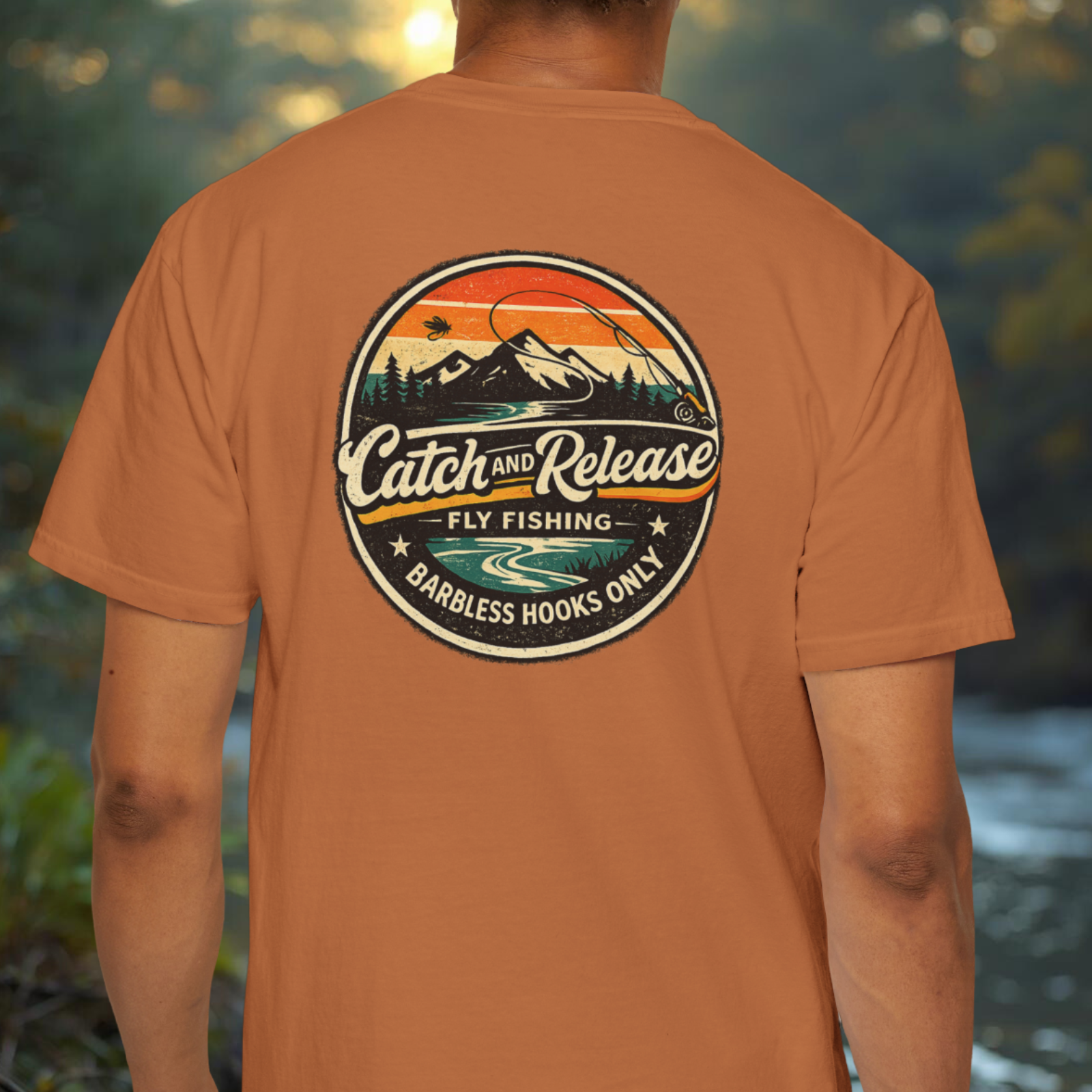 Model wearing a yam tee showing the large “Catch & Release” badge graphic back view.