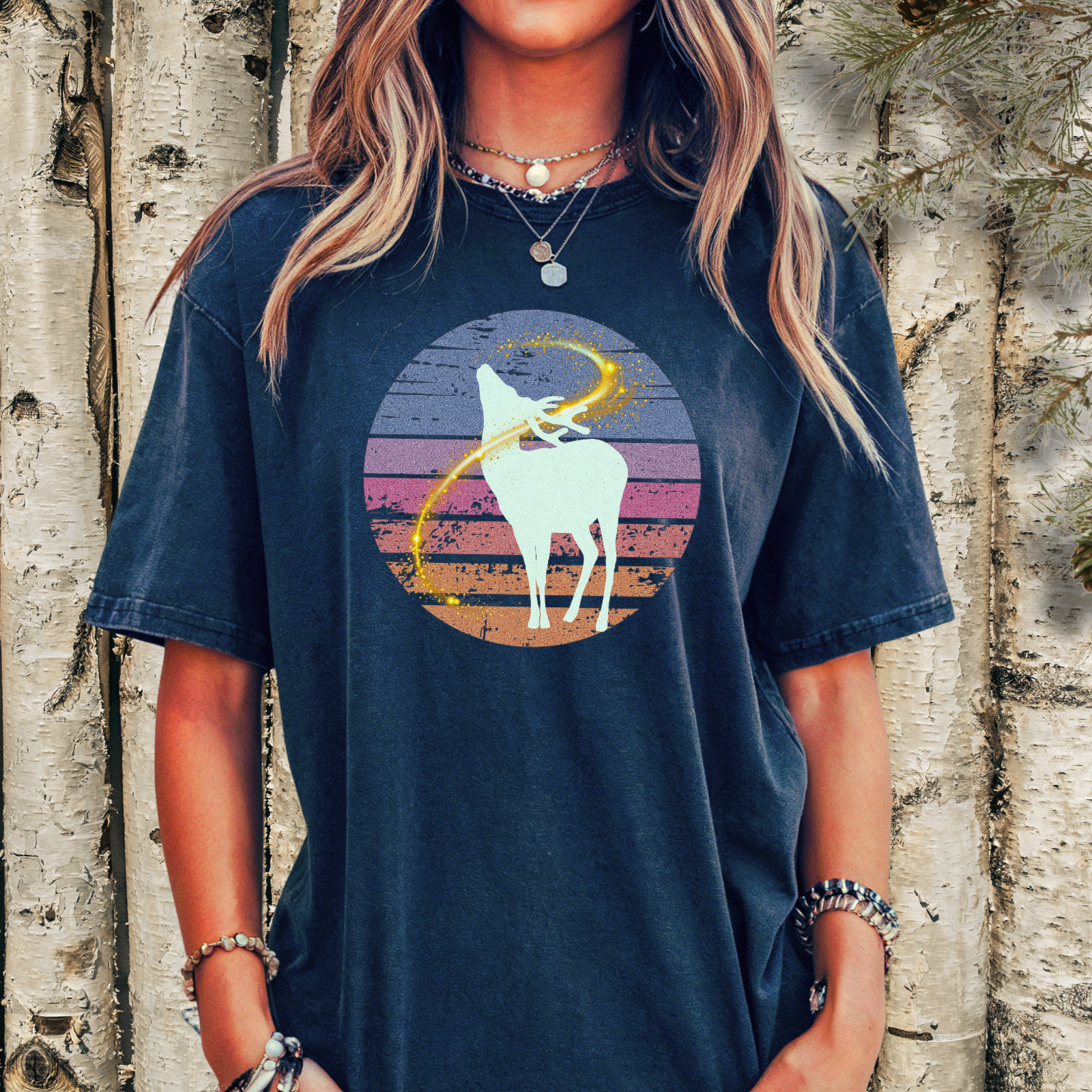 Hiker wearing stag silhouette retro sunset nature tee.