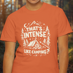 Person wearing an orange t-shirt with a white camping-themed graphic and text.