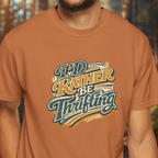 Person wearing a yam t-shirt with 'I'd Rather Be Thrifting' text design.