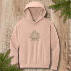 Peachy hoodie with line-drawn lotus flower and “vibes” text on a wooden background