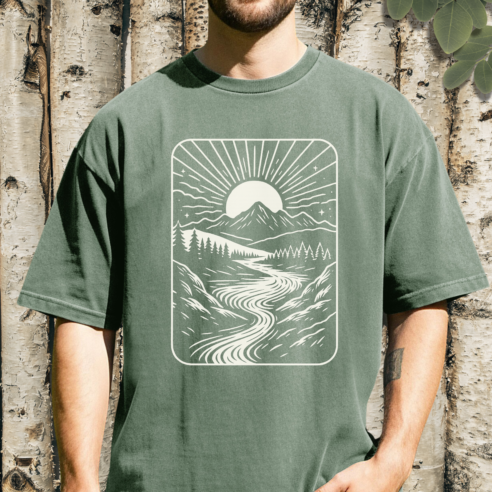 Person wearing River Run mountain sunrise river graphic tee
