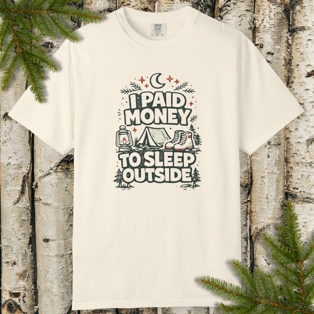 Funny camping graphic t-shirt reading “I Paid Money to Sleep Outside” with rustic outdoor design