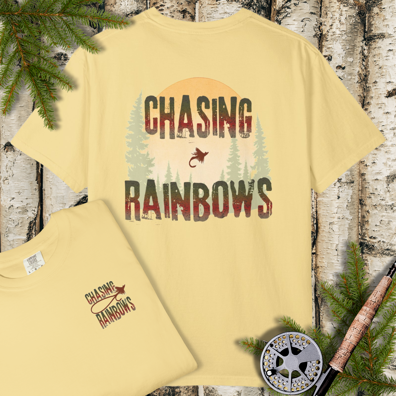 Butter Yellow garment-dyed t-shirt with bold “Chasing Rainbows” rainbow trout fly fishing graphic.