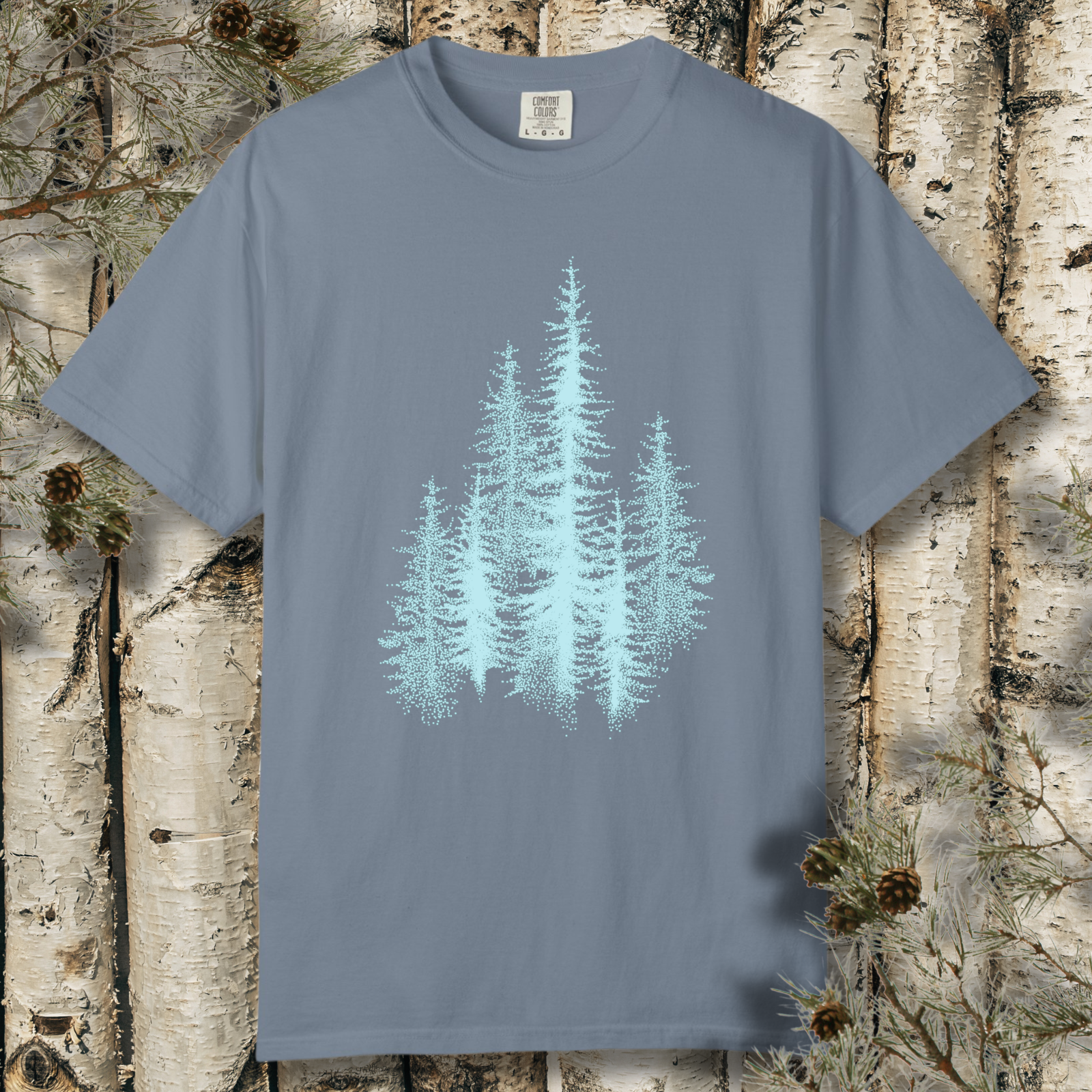 Minimal tree line illustration on blue t-shirt
