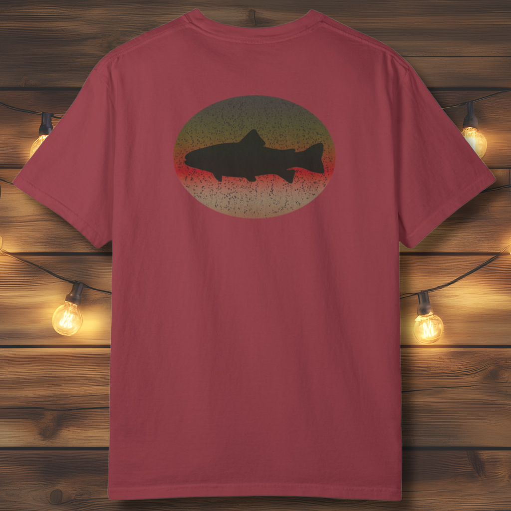 Back view of garment-dyed unisex t-shirt with circular brown trout illustration on wooden backdrop.
