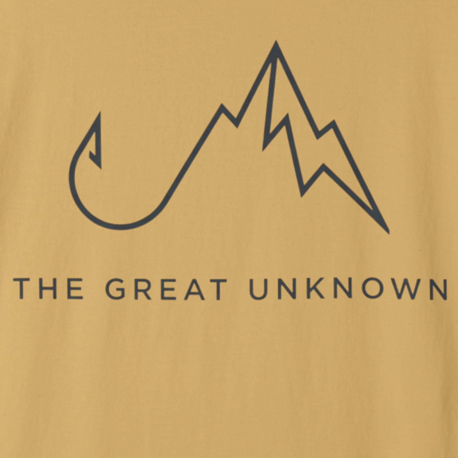 Close-up of “The Great Unknown” mountain graphic on front of t-shirt