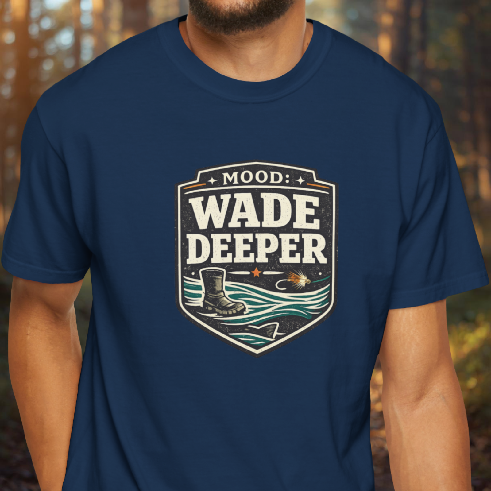 Navy blue t-shirt with 'Mood: Wade Deeper' graphic design in a forest setting