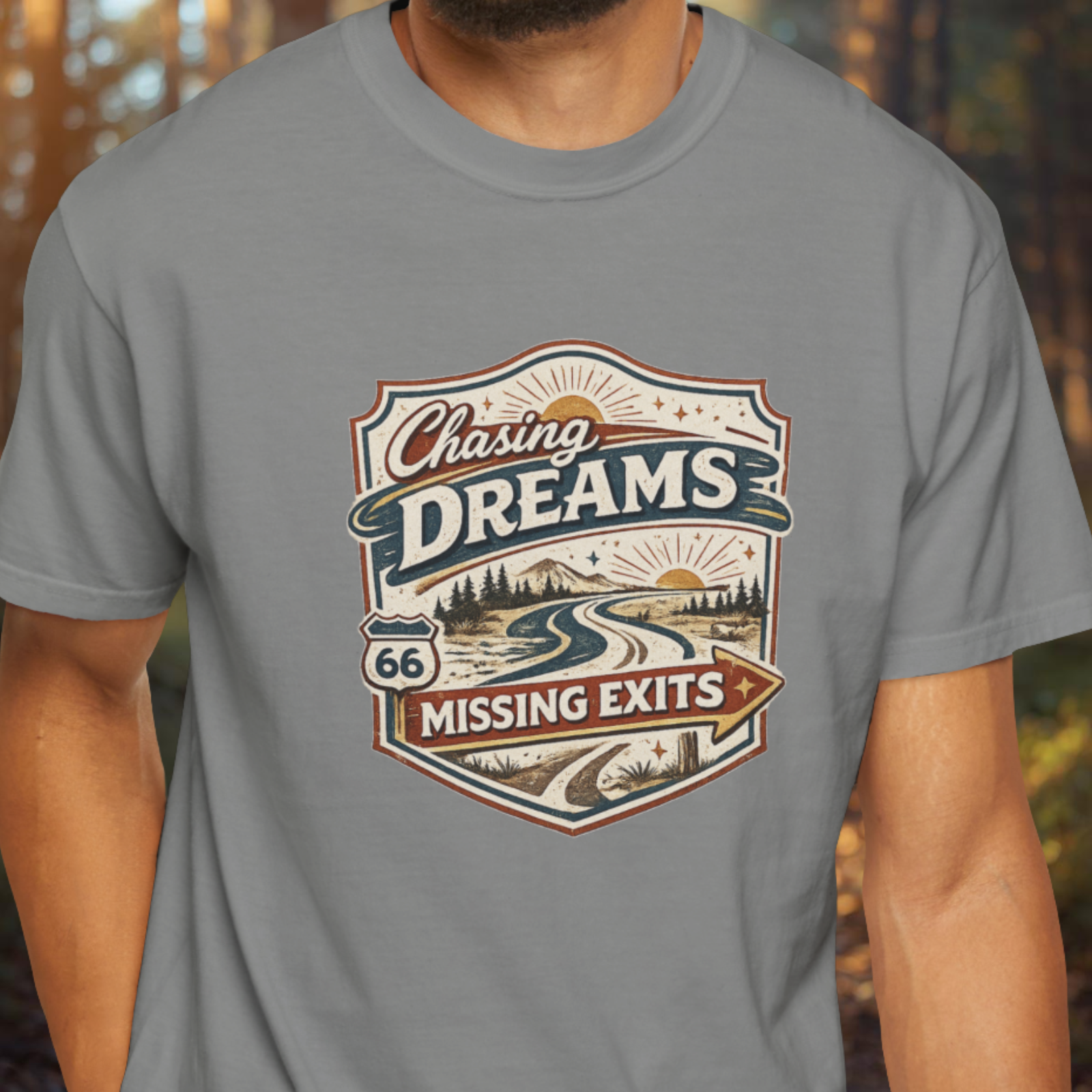 Gray t-shirt with 'Chasing Dreams Missing Exits' graphic design.