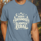 Model wearing Very Grounded Slightly Feral funny nature slogan tee.
