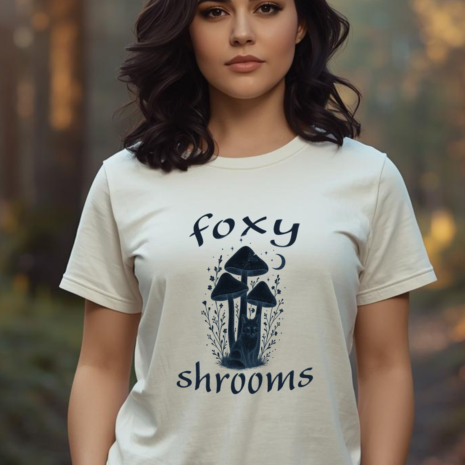 Woman wearing foxy shrooms mushroom graphic tee in a forest setting”