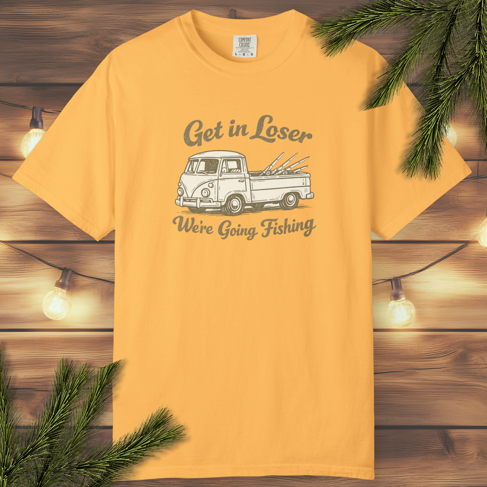 Vintage pickup truck fishing graphic t-shirt with retro lettering that reads “Get in Loser, We’re Going Fishing.”
