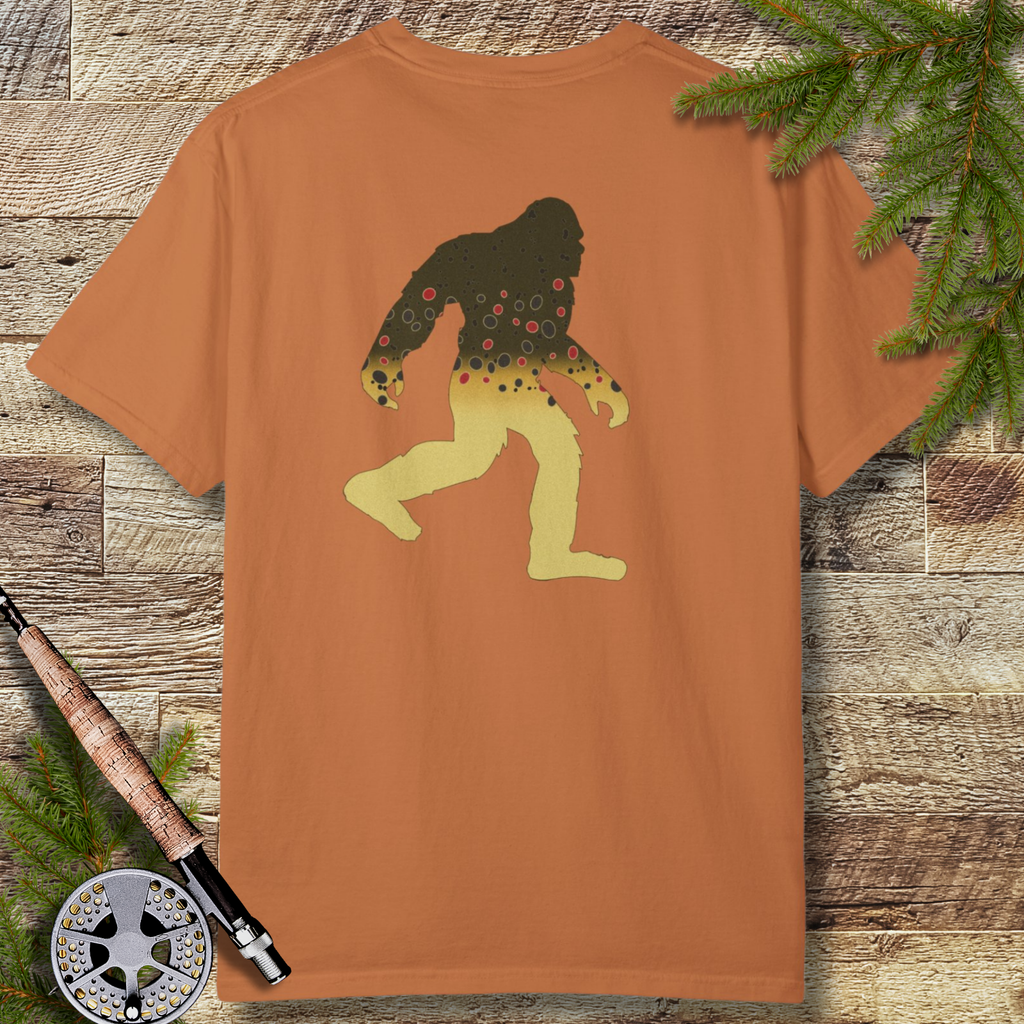 Bigfoot silhouette filled with brown trout pattern on graphic t-shirt