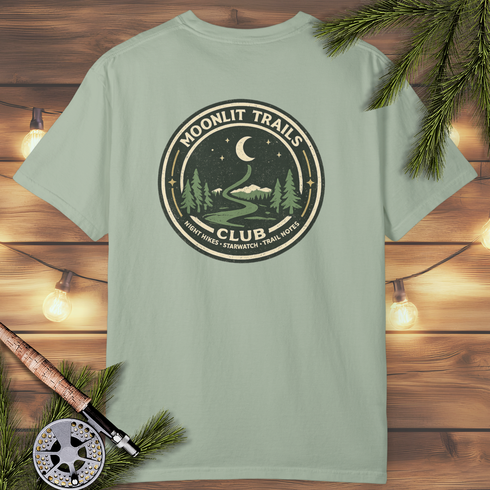 Moonlit Trails Club cozy night hike badge t-shirt with crescent moon and pine trees