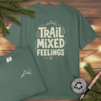 Trail Mixed Feelings graphic with mountain icon on a blue spruce Comfort Colors tee.