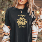 Woman wearing Lotus Glow floral yoga tee at a calm moment