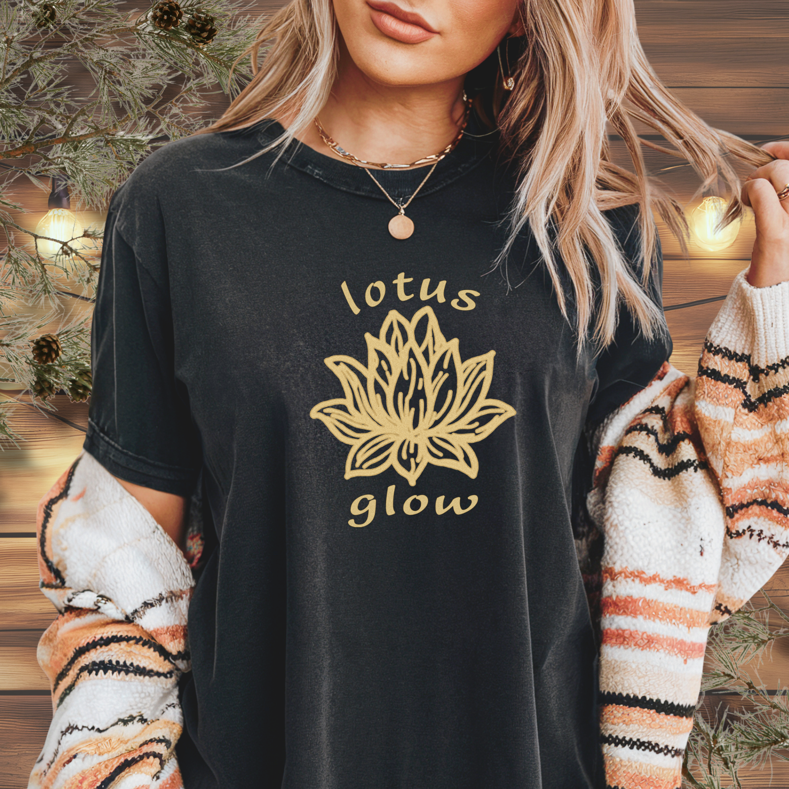 Woman wearing Lotus Glow floral yoga tee at a calm moment